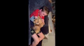 Disabled boy overcome with emotion as parents adopt and surprise him with a disabled therapy dog