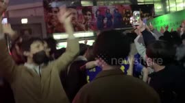 Japan fans celebrate historic World Cup win against Spain