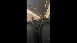 Frontier Airlines - couple forces all of the passengers to deplane after rushing on sans boarding pass.