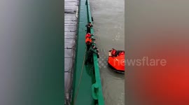 Boat crew rescued after 5,000–tonne cargo ship sinks in southern China