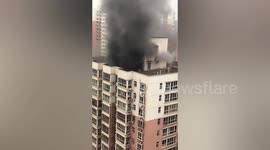 Major fire breaks out at high-rise building, killing five in China