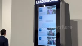 ATM displays bank balance, photo, and ranks richest via leaderboard at Art Basel