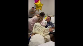 Tears of joy as man who spent two months in a coma sees newborn baby for very first time