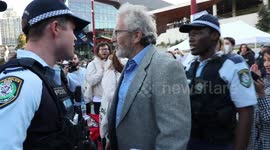 Protesters against Jordan Peterson clash with his supporters outside his event in Sydney
