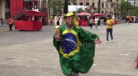 Brazilian fans watch the World Cup game against Cameroon in São Paulo