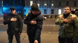 Ukraine singing anthem, London, UK