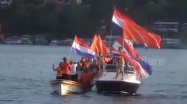 Papua fans of the Dutch team rally behind their side's ambition at the Qatar World Cup