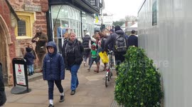Festive fun in Exeter with a Christmas Tree prank on shoppers.