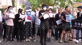 Laura Nguyen, Assistant Project Officer at NSW Health speaks during anti-CCP protest in Sydney, Australia