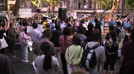Crowd chants at anti-CCP protest near Sydney Town Hall, Australia