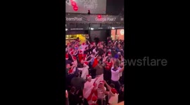 Wild scenes as England fans in Santa hats dance to Vengaboys at Boxpark Wembley after Senegal win