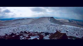 Time lapse of snowy scene over the Brecon Beacons and Corn Du