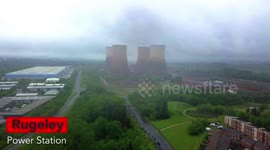 Tumbling power station cooling towers blown up and demolished in Rugeley UK