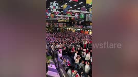 England fans celebrate third goal against Senegal at World Cup in Qatar