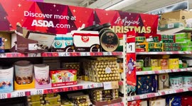 ASDA Christmas chocolate and sweet display as shoppers begin to prepare for Christmas dinner, festivities and parties