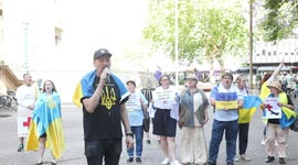 Ukrainians and their supporters protest against the Russian Red Cross in Sydney, Australia