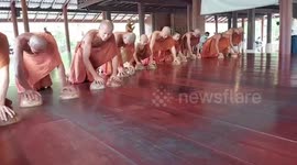 Cleaning hack: Buddhist monks use coconut husks to polish temple