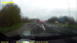 Driver stops for red light that isn't theirs then drives wrong side of road then wrong way around a roundabout.