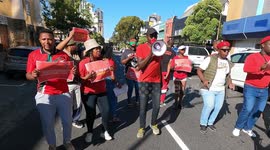 Protest outside pub in South Africa after bouncer allegedly prevented black man from entering without white person