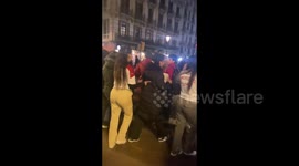 Celebrating on enemy territory! Morocco fans revel World Cup win vs. Spain in Barcelona