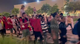 Morocco fans waving goodbye to Spain fans in Doha, Qatar