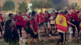 Morocco fans waving goodbye to Spain fans in Doha, Qatar
