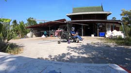 Garage owner builds incredible DIY helicopter from recycled junk in Thailand