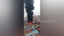 Major fire breaks out at logistics warehouse in central China
