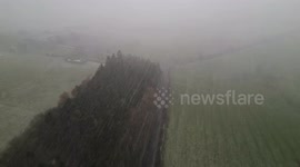 Aerial drone footage of Arctic Blast: Snow blizzard slams England