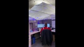 Office employee is overly festive with Christmas cubicle