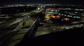 Stock footage 4k drone shot of busy freeway at night