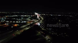 Stock footage 4k drone, busy freeway at night