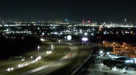 Stock footage 4k drone shot of busy freeway at night