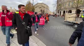 Royal Mail workers march to parliament on 13th day of strike