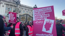 Thousands of UK postal workers demand help from King Charles as they march to Buckingham Palace in row over conditions