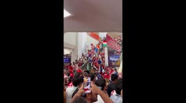 Croatian fans celebrate their team's victory after the match against Brazil