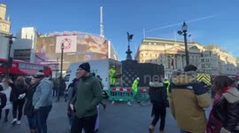 Barrier installed around Eros statue in London's Piccadilly Circus ahead of France-England match