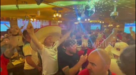 Fans at Doha's Red Lion pub sing 'Ing-er-land, ING-ER-LAND' ahead of France clash