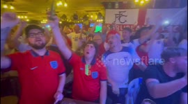 England fans at Doha's Red Lion pub join house band in singing Fat Les' 'Vindaloo'