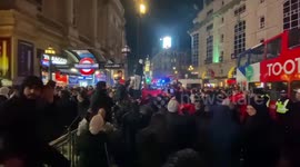 Moroccon fans celebrate semi-final in London’s Piccadilly Circus