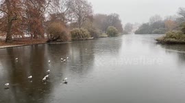 UK Weather: Frozen St. James's Park Lake in central London