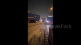 Motorway chaos in southeast England as M11 and M25 hit by snow