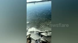 Heroic man shouts ‘run’ to ice fishermen on thawing river in China