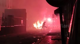 Total chaos in Paris: Unruly football fans take to streets