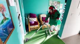 Woman spends every day in December dressed as an ELF to spread Christmas joy