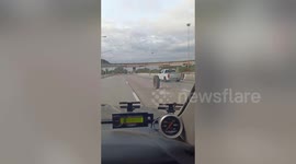 Bizarre 'ghost wheel' rolls down road in Thailand