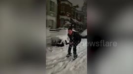 Londoner hilariously swaps slopes for streets and skis down residential road