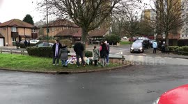 Floral tributes were left for three young boys confirmed dead after plunging into a frozen lake
