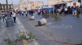 Protest battlefield in Peru: Rocks vs smoke bombs