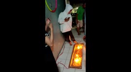 A child blowing out a birthday cake gone wrong